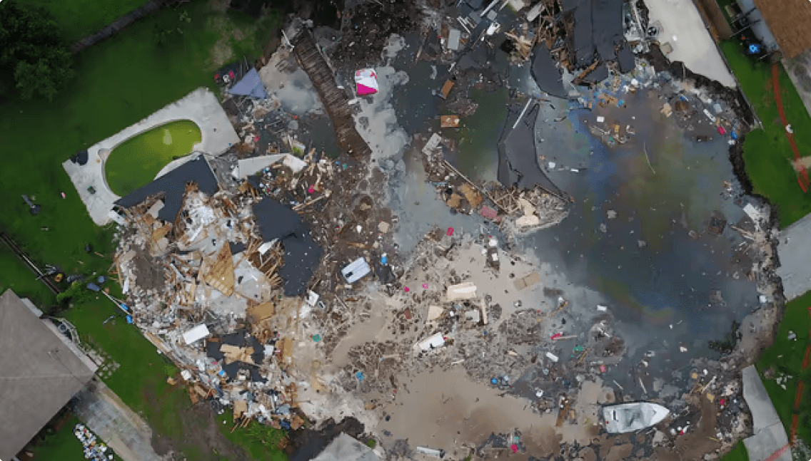 Aerial view of the 260-foot sinkhole in Pasco County, FL.