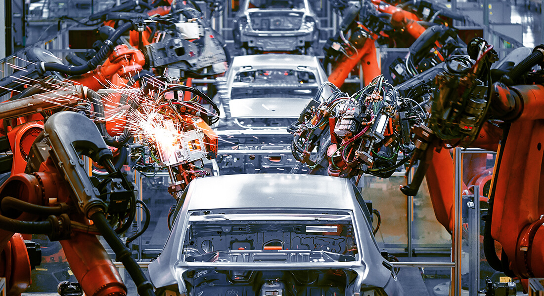 Machines working on a car